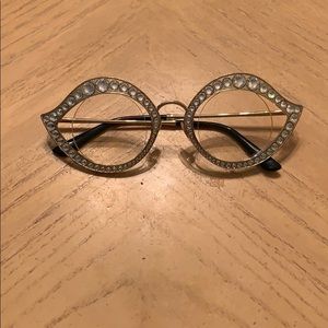 Gucci gold cateye sunglasses with crystals